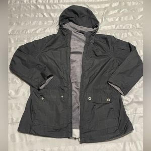 Reversible two in one grey and black rain jacket
